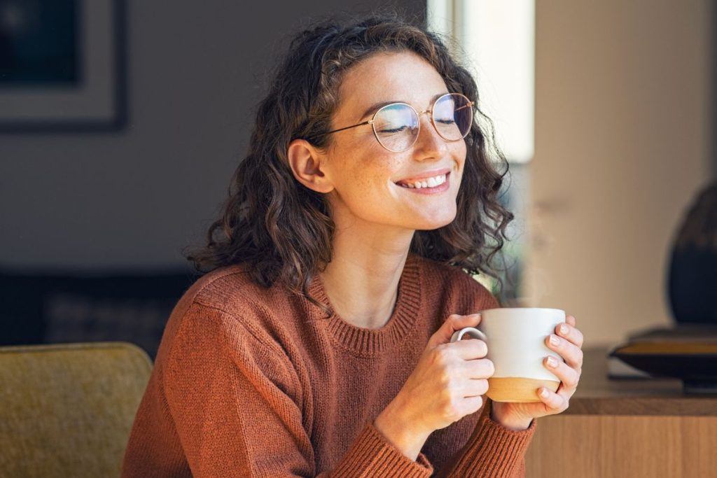 A lady feeling relaxed after drinking kava extract tea.