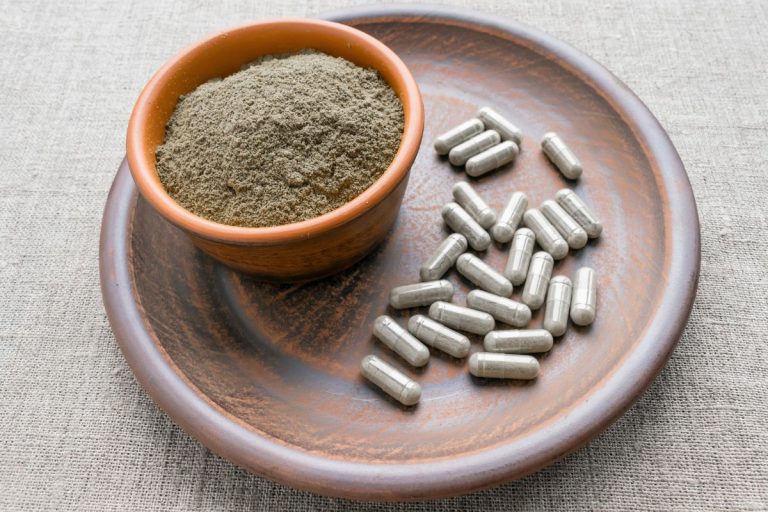 Kava capsules and powder in the image.